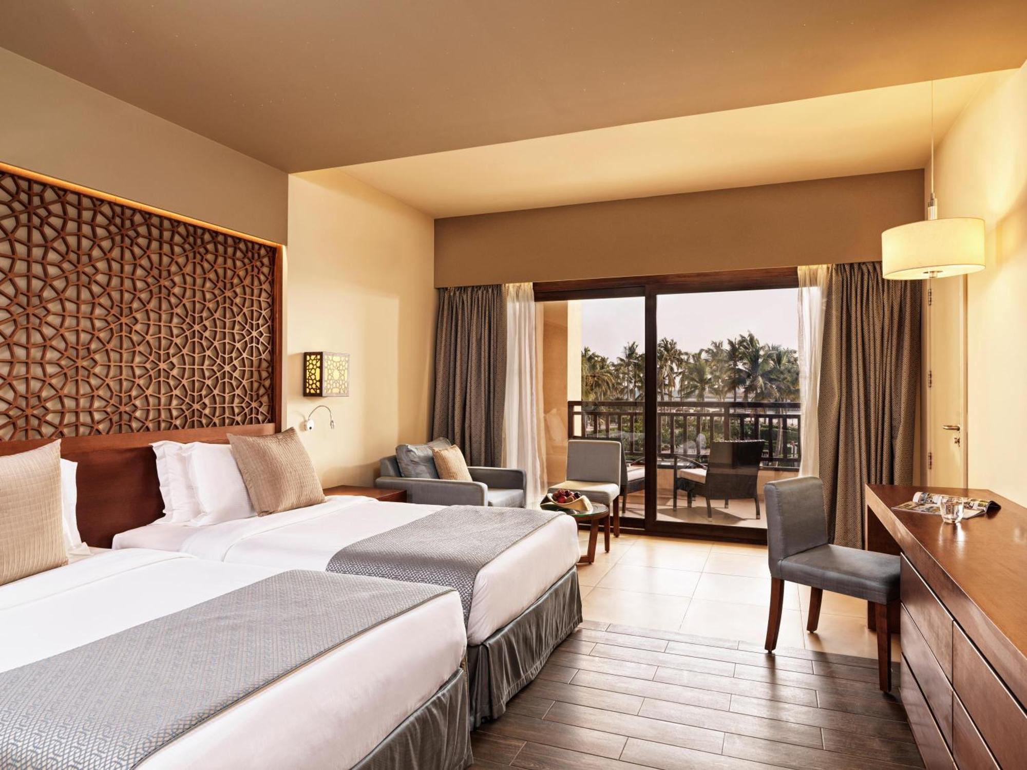 Fanar Hotel & Residences Salalah Exterior foto A room at the hotel